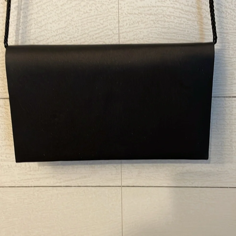 Black and red retro 80's or 90's vintage women's purse with magnetic clasp party